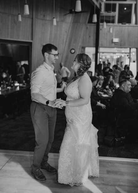 Laura and Joe twirl around the dance floor.