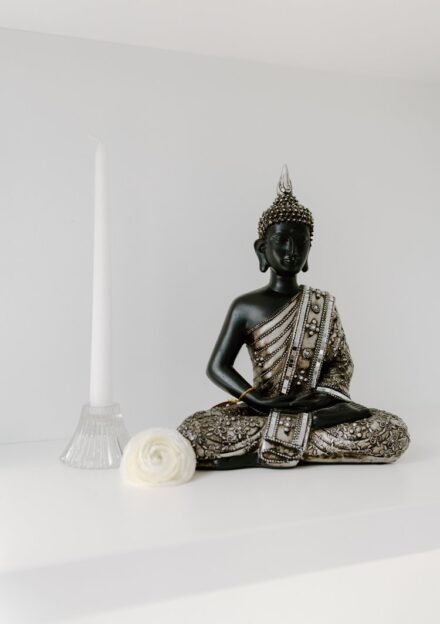 A black and silver buddha statue on display at a Khmer wedding at The Whim in Minneapolis.