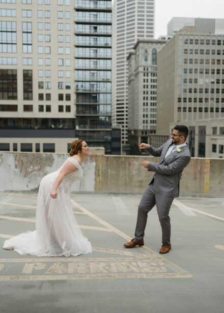 The couple dances together on the rooftop of the venue.