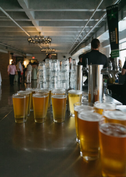 Lines of draft beer stand at the ready at the bar during cocktail hour.
