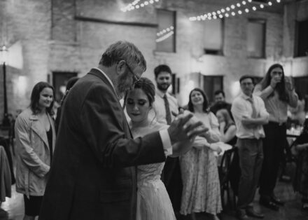 Connie dances with her dad during the father daughter dance.